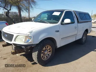 2002 Ford F-150 XL with VIN 1FTRF17282KA85955, listed as a IAAI auction lot 41424999 with 183,700 mi miles and . Bid and sale history available at DreamBid. Image 2.