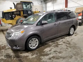 2014 Toyota Sienna XLE with VIN 5TDYK3DC1ES517413, listed as a Copart auction lot 57411375 with 126,001 mi miles and Clean title. Bid and sale history available at DreamBid. Image 1.