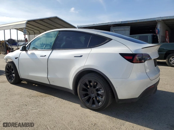 2022 Tesla Model Y Long Range with VIN 7SAYGDEE1NF559238, listed as a Copart auction lot 86744664 with 59,074 mi miles and Salvage Title. Bid and sale history available at carsss.com. Image 2.