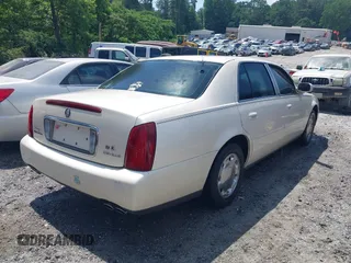 2001 Cadillac DeVille z VIN 1G6KD54Y91U197323, wystawiony jako IAAI lot #42251408 z przebiegiem Nie podano mil oraz . Historia ofert i sprzedaży dostępna na DreamBid. Obrazek 4.