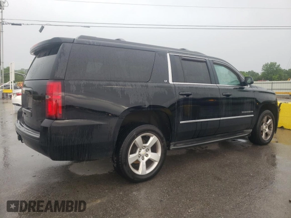 2015 Chevrolet Suburban LT with VIN 1GNSKJKC5FR504863, listed as a Copart auction lot 55305665 with 200,488 mi miles and Clean Title. Bid and sale history available at DreamBid. Image 3.
