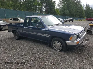 1994 Toyota Pickup DX with VIN JT4RN93P9R5106937, listed as a Copart auction lot 63055765 with 128,039 mi miles and Clean title. Bid and sale history available at DreamBid. Image 4.
