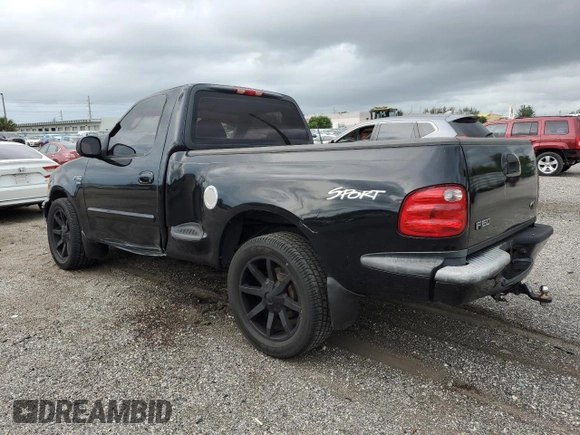 2003 Ford F-150 XL with VIN 1FTRF07W33KB56591, listed as a Copart auction lot 64170993 with 150,941 mi miles and Salvage title. Bid and sale history available at DreamBid. Image 2.