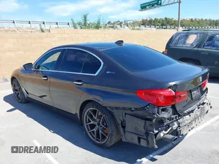 2018 BMW 5 Series 530e xDrive with VIN WBAJB1C58JB085443, listed as a IAAI auction lot 41856298 with 93,110 mi miles and . Bid and sale history available at DreamBid. Image 3.