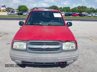 2003 Chevrolet Tracker ZR2 z VIN 2CNBJ734736914220, wystawiony jako IAAI lot #42351611 z przebiegiem 190 578 mil mil oraz . Historia ofert i sprzedaży dostępna na DreamBid. Obrazek 6.