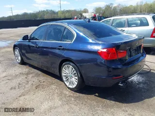 2013 BMW 3 Series 328i xDrive with VIN WBA3B3C54DF532965, listed as a IAAI auction lot 41955104 with 150,455 mi miles. Bid and sale history available at carsss.com. Image 3.