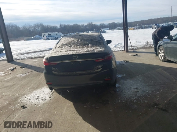 2021 Mazda 6 Carbon Edition with VIN JM1GL1WY6M1616617, listed as a IAAI auction lot 41365615 with 60,747 mi miles and . Bid and sale history available at DreamBid. Image 16.