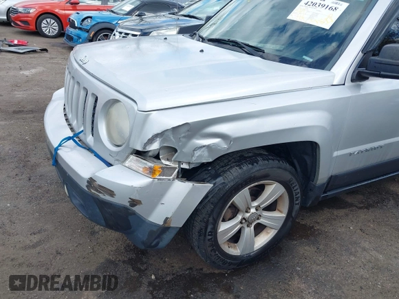 2011 Jeep Patriot Sport with VIN 1J4NF1GBXBD118483, listed as a IAAI auction lot 42039168 with 174,048 mi miles. Bid and sale history available at carsss.com. Image 6.