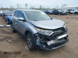 2019 Honda CR-V EX with VIN 2HKRW2H5XKH638800, listed as a IAAI auction lot 42061457 with 54,440 mi miles. Bid and sale history available at carsss.com. Image 1.