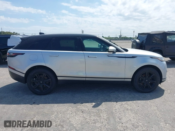 2020 Land Rover Range Rover Velar S z VIN SALYB2EXXLA255258, wystawiony jako IAAI lot #41823002 z przebiegiem 66 527 mil mil oraz . Historia ofert i sprzedaży dostępna na DreamBid. Obrazek 14.