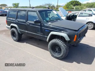 1998 Jeep Cherokee Sport with VIN 1J4FJ68S9WL251908, listed as a IAAI auction lot 41981748 with 251,556 mi miles. Bid and sale history available at carsss.com. Image 1.