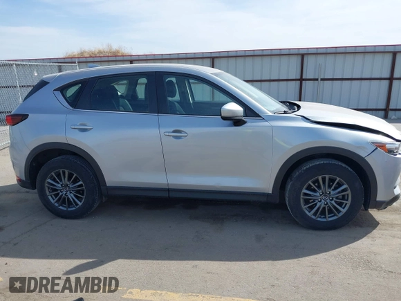 2019 Mazda CX-5 Sport with VIN JM3KFBBM6K1582760, listed as a IAAI auction lot 41822152 with 60,620 mi miles and . Bid and sale history available at DreamBid. Image 13.