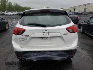2016 Mazda CX-5 Sport z VIN JM3KE4BY2G0802376, wystawiony jako Copart lot #55976585 z przebiegiem 112 600 mil mil oraz Szkoda całkowita • Salvage title. Historia ofert i sprzedaży dostępna na DreamBid. Obrazek 6.