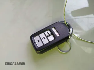 2020 Honda Civic EX-L with VIN 19XFC1F74LE009078, listed as a IAAI auction lot 41403928 with Not Provided miles and . Bid and sale history available at DreamBid. Image 11.