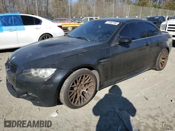 2011 BMW M3 with VIN WBSDX9C52BE584764, listed as a Copart auction lot 83572554 with 138,245 mi miles and Salvage Title. Bid and sale history available at carsss.com. Image 1.