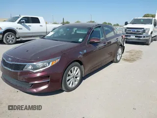 2017 Kia Optima LX with VIN 5XXGT4L33HG129749, listed as a IAAI auction lot 40360996 with 174,803 mi miles. Bid and sale history available at carsss.com. Image 2.