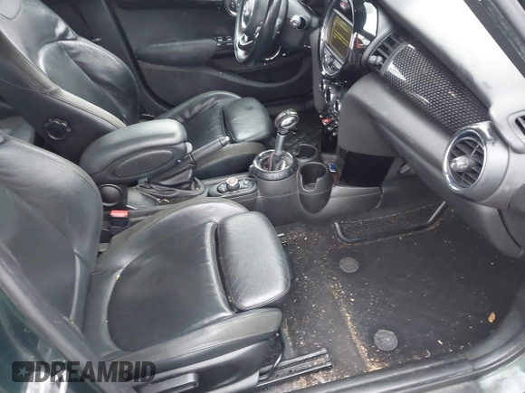 2016 MINI Cooper Hardtop 4 Door S with VIN WMWXU3C58G2D31595, listed as a IAAI auction lot 41267547 with 145,191 mi miles. Bid and sale history available at carsss.com. Image 5.