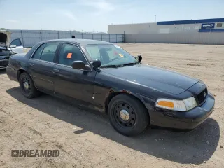 2009 Ford Police Interceptor with VIN 2FAHP71V59X148683, listed as a Copart auction lot 56866125 with Not provided miles and Salvage title. Bid and sale history available at DreamBid. Image 4.