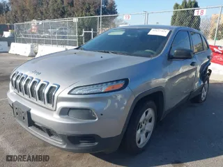 2014 Jeep Cherokee Sport with VIN 1C4PJLAB0EW288538, listed as a IAAI auction lot 41657421 with 123,654 mi miles. Bid and sale history available at carsss.com. Image 2.