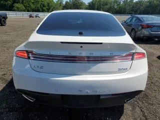 2015 Lincoln MKZ z VIN 3LN6L2JK8FR616661, wystawiony jako Copart lot #61588325 z przebiegiem 65 382 mil mil oraz Szkoda całkowita • Salvage title. Historia ofert i sprzedaży dostępna na DreamBid. Obrazek 6.