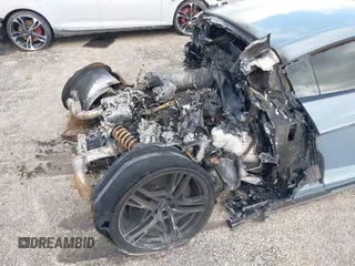 2021 Audi R8 z VIN WUAKBAFX5M7900468, wystawiony jako IAAI lot #41214857 z przebiegiem Nie podano mil oraz . Historia ofert i sprzedaży dostępna na DreamBid. Obrazek 12.