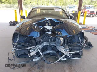 2017 BMW 7 Series 750i z VIN WBA7F0C59HGM21185, wystawiony jako IAAI lot #42360146 z przebiegiem Nie podano mil oraz . Historia ofert i sprzedaży dostępna na DreamBid. Obrazek 13.