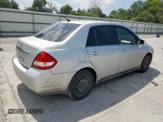 2009 Nissan Versa S with VIN 3N1BC11E39L376873, listed as a Copart auction lot 60299465 with 134,769 mi miles and Salvage title. Bid and sale history available at DreamBid. Image 3.