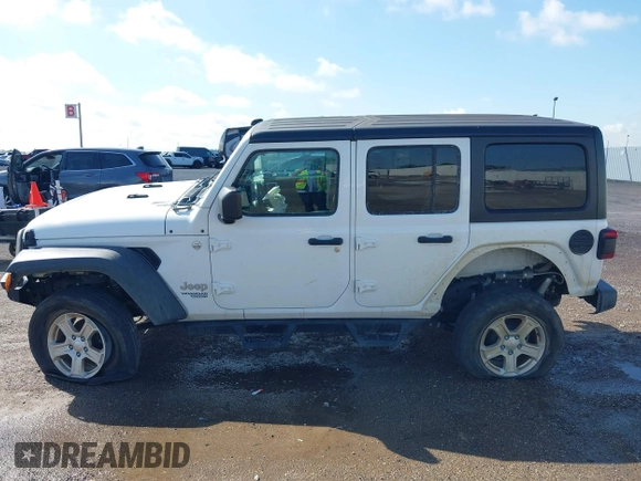 2020 Jeep Wrangler Unlimited Sport with VIN 1C4HJXDM2LW262867, listed as a IAAI auction lot 42303520 with 56,461 mi miles and . Bid and sale history available at DreamBid. Image 14.