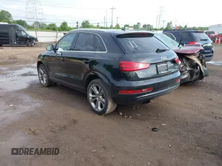 2015 Audi Q3 Premium Plus z VIN WA1EFCFS6FR001473, wystawiony jako IAAI lot #42795951 z przebiegiem 148 638 mil mil oraz . Historia ofert i sprzedaży dostępna na DreamBid. Obrazek 3.