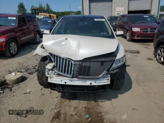 2011 Lincoln MKX with VIN 2LMDJ8JK3BBJ33995, listed as a Copart auction lot 69060004 with 188,962 mi miles and Salvage Title. Bid and sale history available at carsss.com. Image 5.