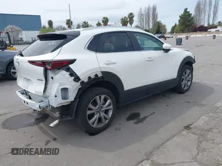 2023 Mazda CX-30 S Carbon Edition with VIN 3MVDMBCM0PM569100, listed as a IAAI auction lot 41978191 with 20,470 mi miles and . Bid and sale history available at DreamBid. Image 4.