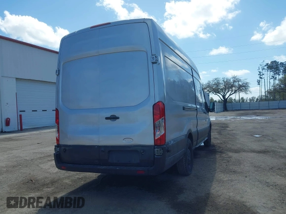 2017 Ford Transit Cargo with VIN 1FTBW3XG0HKB03320, listed as a IAAI auction lot 41706643 with 69,887 mi miles. Bid and sale history available at carsss.com. Image 4.