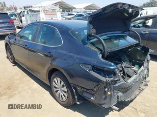 2021 Toyota Camry Hybrid LE with VIN 4T1C31AK5MU552226, listed as a IAAI auction lot 40210726 with 107,331 mi miles. Bid and sale history available at carsss.com. Image 3.