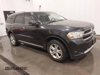 2013 Dodge Durango Crew with VIN 1C4RDJDGXDC691311, listed as a IAAI auction lot 41642267 with 167,098 mi miles and . Bid and sale history available at carsss.com. Image 1.