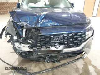 2023 Hyundai Santa Fe SE z VIN 5NMS1DAJ3PH592136, wystawiony jako IAAI lot #42263727 z przebiegiem 21 102 mil mil oraz . Historia ofert i sprzedaży dostępna na DreamBid. Obrazek 6.