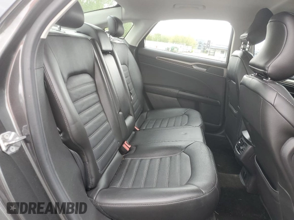 2015 Ford Fusion SE z VIN 3FA6P0H95FR206535, wystawiony jako Copart lot #54242105 z przebiegiem 83 001 mil mil oraz Szkoda całkowita • Salvage title. Historia ofert i sprzedaży dostępna na DreamBid. Obrazek 10.
