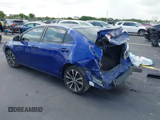 2017 Toyota Corolla L with VIN 5YFBURHE3HP632686, listed as a IAAI auction lot 42355095 with 122,139 mi miles and . Bid and sale history available at DreamBid. Image 3.