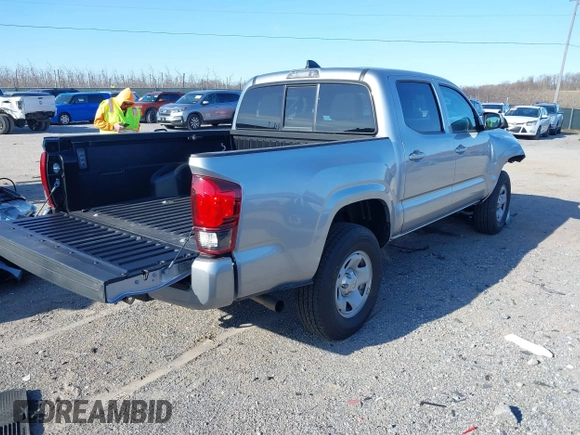 2023 Toyota Tacoma 4WD SR with VIN 3TMCZ5AN2PM638929, listed as a IAAI auction lot 41860423 with 12,246 mi miles. Bid and sale history available at carsss.com. Image 4.