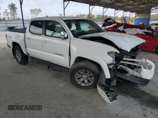 2016 Toyota Tacoma SR with VIN 5TFCZ5AN9GX014233, listed as a Copart auction lot 52016485 with 260,017 mi miles and Salvage Title. Bid and sale history available at carsss.com. Image 4.