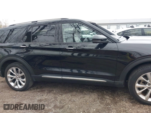 2022 Ford Explorer Platinum z VIN 1FM5K8HC6NGA72795, wystawiony jako IAAI lot #41955734 z przebiegiem 41 373 mil mil oraz . Historia ofert i sprzedaży dostępna na DreamBid. Obrazek 14.