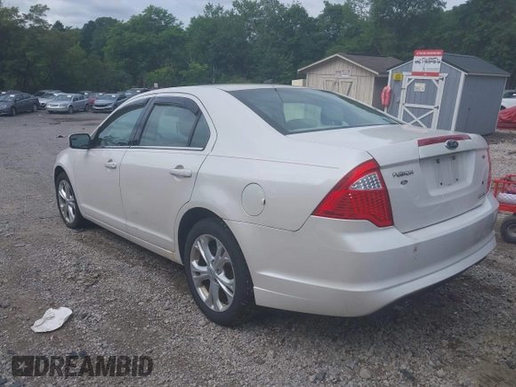 2012 Ford Fusion SE with VIN 3FAHP0HG1CR320910, listed as a IAAI auction lot 42785831 with 115,986 mi miles and . Bid and sale history available at DreamBid. Image 3.
