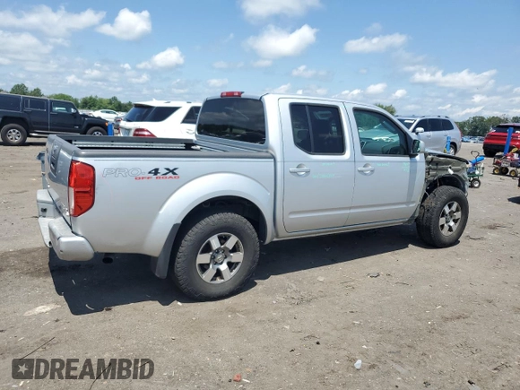2010 Nissan Frontier Pro-4X with VIN 1N6AD0EV5AC435641, listed as a Copart auction lot 63388025 with 84,349 mi miles and Salvage title. Bid and sale history available at DreamBid. Image 3.