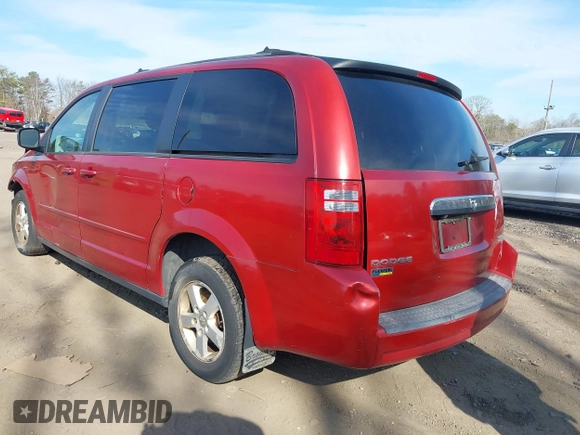 2009 Dodge Grand Caravan SE with VIN 2D8HN44E79R673244, listed as a IAAI auction lot 41913383 with 121,895 mi miles and . Bid and sale history available at DreamBid. Image 3.