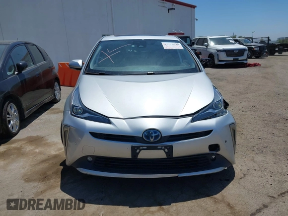 2022 Toyota Prius L Eco with VIN JTDKAMFU5N3188107, listed as a IAAI auction lot 42223649 with 180,894 mi miles and . Bid and sale history available at DreamBid. Image 13.