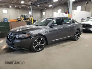 2015 Ford Taurus SEL with VIN 1FAHP2E81FG167546, listed as a Copart auction lot 49114795 with 185,587 mi miles and Salvage Title. Bid and sale history available at carsss.com. Image 1.