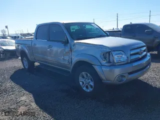 2005 Toyota Tundra SR5 with VIN 5TBET34105S483228, listed as a IAAI auction lot 41640857 with 214,498 mi miles. Bid and sale history available at carsss.com. Image 1.