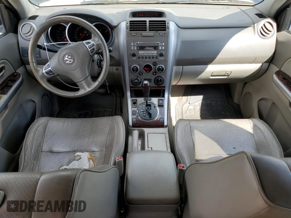 2008 Suzuki Grand Vitara Luxury z VIN JS3TD947784101653, wystawiony jako Copart lot #55773325 z przebiegiem 156 227 mil mil oraz Szkody całkowita. Historia ofert i sprzedaży dostępna na DreamBid. Obrazek 8.