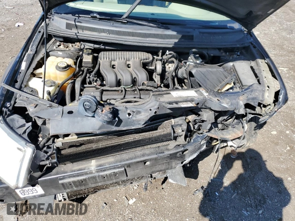 2007 Ford Freestyle SEL z VIN 1FMDK02107GA31747, wystawiony jako Copart lot #49525865 z przebiegiem 172 765 mil mil oraz Szkoda całkowita • Salvage title. Historia ofert i sprzedaży dostępna na DreamBid. Obrazek 13.