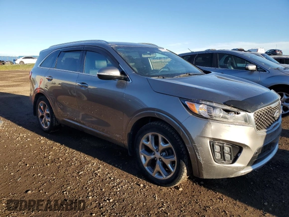 2016 Kia Sorento SXL z VIN 5XYPKDA15GG105354, wystawiony jako Copart lot #79710674 z przebiegiem 167 327 mil mil oraz Czysty tytuł • Clean title. Historia ofert i sprzedaży dostępna na DreamBid. Obrazek 4.