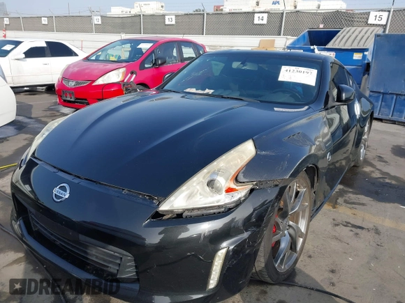 2014 Nissan 370Z Touring with VIN JN1AZ4EH1EM631097, listed as a IAAI auction lot 41230197 with 85,304 mi miles. Bid and sale history available at carsss.com. Image 6.